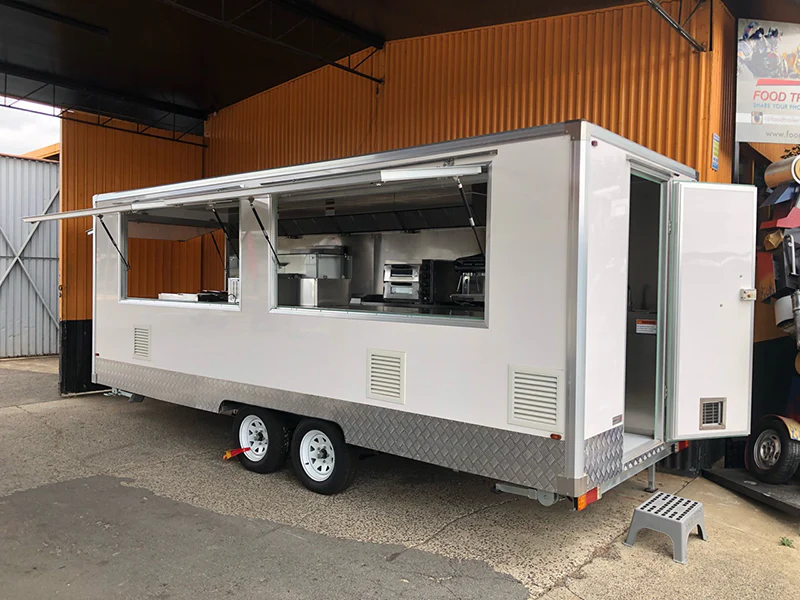 Compact coffee and kiosk trailer